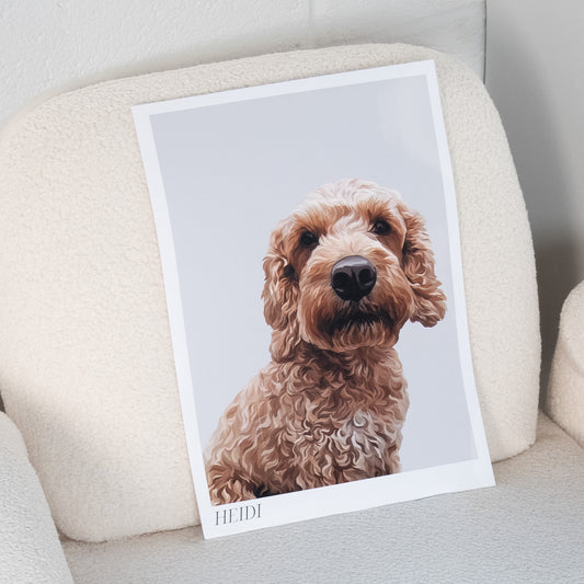 A photo of an A3 Bordered Detailed Pet Portrait of a Cockapoo called Heidi leaning on a cream sofa.