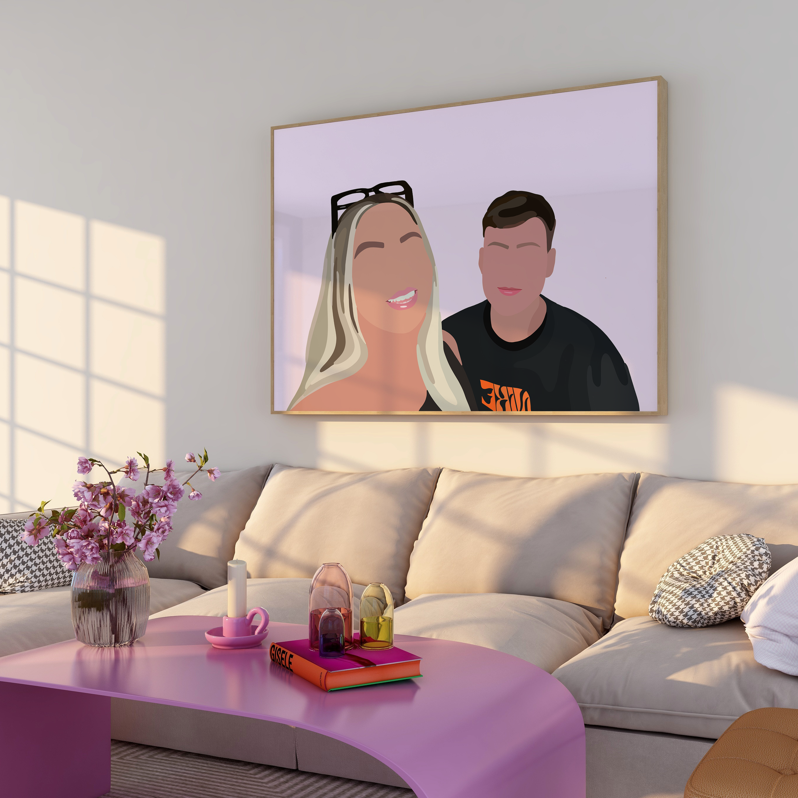Modern living room with a gray sofa, pink coffee table, and a framed Faceless Portrait on the wall of a boy and a girl on a pink background.