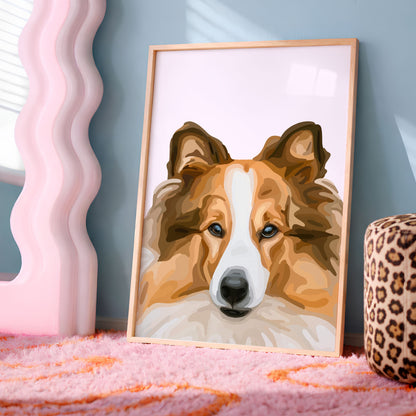 A framed custom Cartoon Pet Portrait of a Collie dog leaning against a blue-grey wall on a pink rug, next to a pink wavy mirror and a leopard print ottoman.
