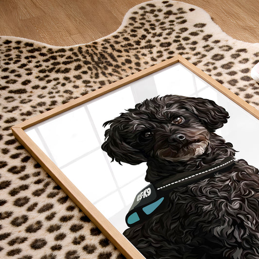 A framed Detailed Pet Portrait of a black curly-haired dog wearing a blue and black K9 harness, displayed on a leopard-print rug over a wooden floor.