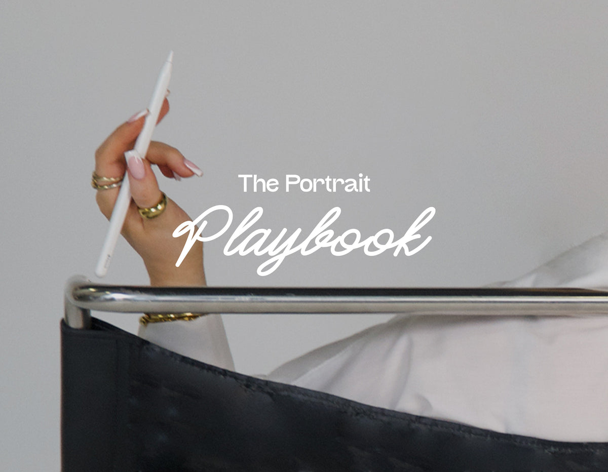 A hand holding a white stylus above a black chair, with the text 'The Portrait Playbook' on a light gray background.