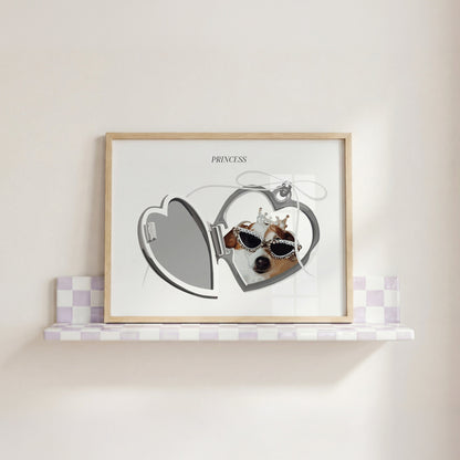 Locket Portrait print of a Chihuahua with a crown on in a wooden frame on a purple and white tiled shelf.