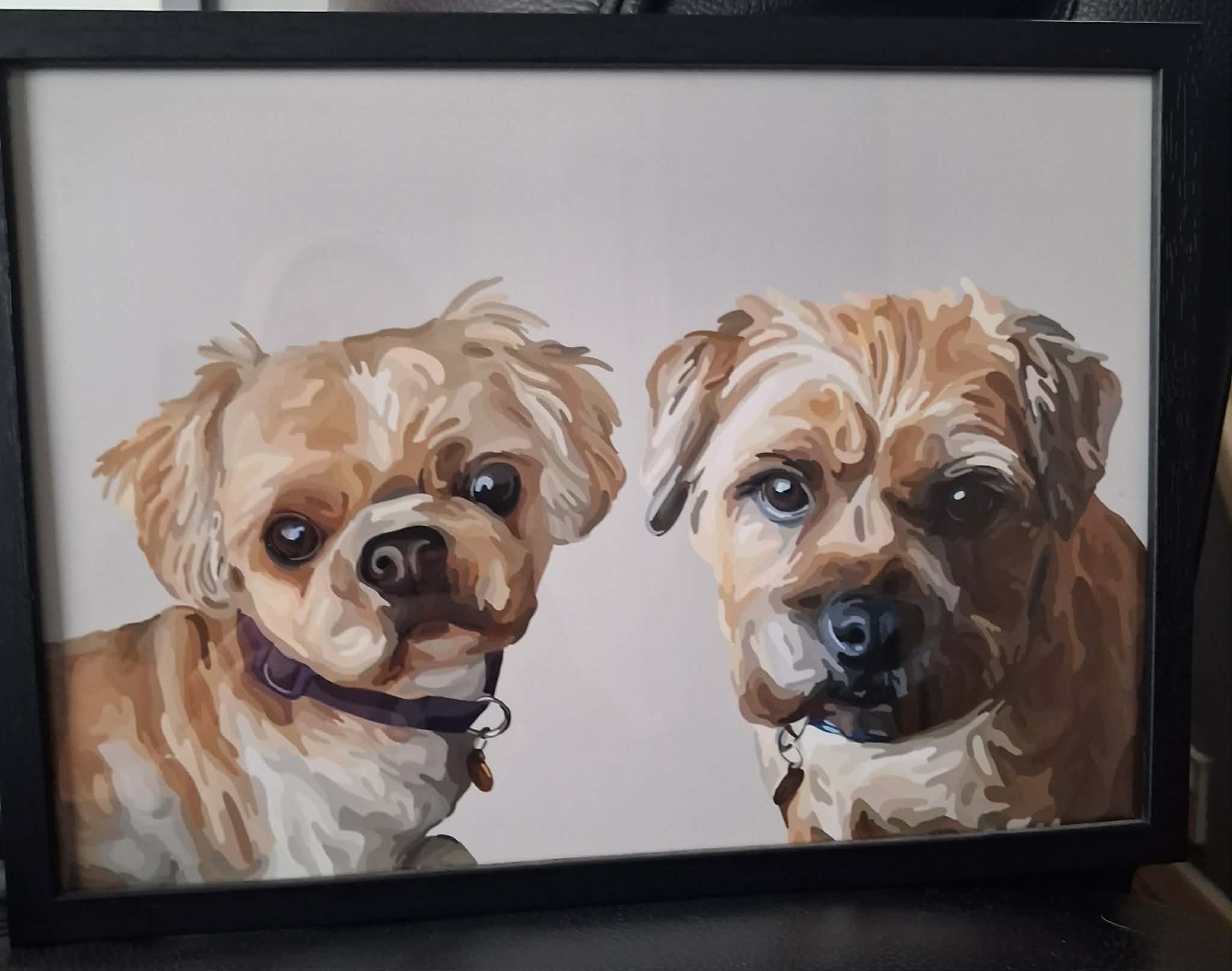 Cartoon Pet Portrait showing two small tan and white dogs with dark eyes, set in a black frame.